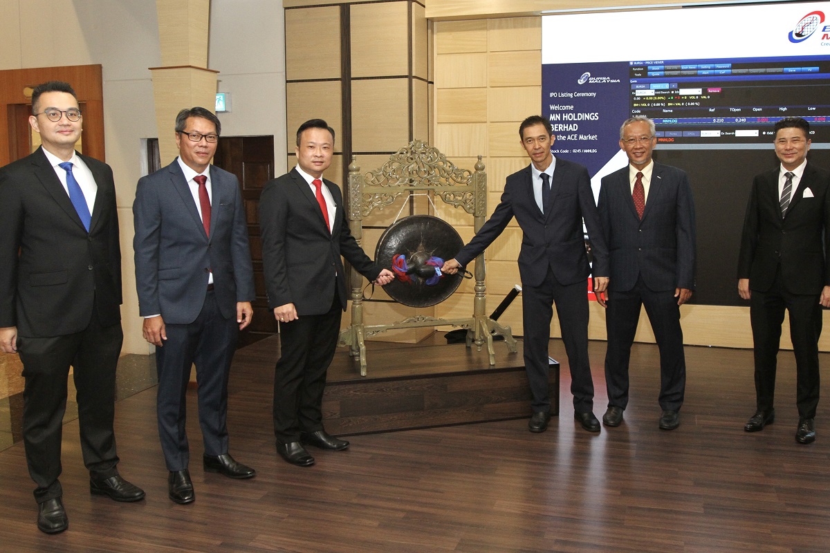 (From left) M&A Securities Sdn Bhd deputy head of corporate finance Danny Wong, with MN Holdings Bhd (MNHB) executive directors Dang Siong Diang and Datuk Clement Toh, managing director Loy Siong Hay and chairman Datuk Zainurin Karman, and M&A Securities managing director of corporate finance Datuk Bill Tan at the listing ceremony of MNHB on the ACE Market of Bursa Malaysia in Kuala Lumpur on Thursday (April 28).